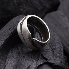 Delicate and strong at the same this ring was inspired by the Scandinavian rocky mountains and its stone texture highlights the resilience and the strength of character. We ship with FedEx courier Like this Product? Take a look at these:  ☼ Men's black slate silver signet ring  https://www.etsy.com/listing/573134617/black-slate-mens-signet-ring-sterling  ☼ Men`s unique design wide silver ring https://www.etsy.com/listing/559081540/black-slate-mens-wide-ring-sterling  If you are like us charmed b Masculine Silver Rings, Nature-inspired Polished Ring Jewelry, Nature-inspired Polished Jewelry Ring, Nature-inspired Polished Ring, Nature-inspired Polished Finish Ring, Brutalist Style Metal Open Ring, Brutalist Style Open Metal Ring, Handmade Brutalist Open Ring Jewelry, Brutalist Hand-forged Open Ring Jewelry