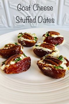 goat cheese stuffed dates on a white plate