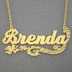 "*Average Name Pendant Width : 1 3/4 Inch (4.5 cm) Approx. *Up to 9 Letters. *Pendant Thickness : 0.5 mm / 25 Gauge / 0.020\" *Premium high end quality personalized laser cut out any letters/numbers in 10kt or 14kt solid yellow or white gold personalized name necklace, this item comes with split sturdy 1.25 mm Flat Rollo chain from 15~20 inches, name pendant length not included on length option. *This pendant cut out by latest technology laser machine, top quality guaranteed. *All personalized j Gold Name Necklace With Flower Shape, Gold Flower-shaped Name Necklace, Gold Flower Necklace With Name, Elegant Name Necklace With Flower Pendant, Gold Flower Jewelry With Intricate Design, Gold Engraved Flower-shaped Necklace, Gold Engraved Flower Shaped Necklace, Classic Gold Jewelry In Flower Shape, Ornate 14k Stamped Necklaces For Anniversary