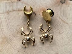 "6g (4mm) - 1 3/16 (30mm) 18k Plated \"Radiant Gold Weaver\" Earrings Saddles Hiders Drop Dangle Earrings Gauges/Earplugs Plugs. 🕷️✨ Add a touch of playful mystique to your style with our \"Radiant Gold Weaver\" earrings. Plated in stunning 18K gold, these earrings feature a whimsical spider design that adds a dash of intrigue to your stretched lobes. Let your ears shimmer with the allure of these unique accessories, perfect for those who appreciate the enchanting beauty of spiders. PLEASE read section regarding sizing before purchasing as due to sensitive nature of my products (body jewelry) as I cannot accept returns of exchanges.  HIDERS:  The plugs themselves are stainless steel w/black silicone 'o' ring and disc is gold plated copper.  The plug in this photo is 12mm and the disc is 1 Gold Internally Threaded Plug Earrings, Gold Internally Threaded Drop Earrings, Adjustable Internally Threaded Plug Earrings As Gift, Unique Gold Body Jewelry Gift, Unique Gold Body Jewelry As Gift, Nickel-free Gold Gothic Jewelry, Adjustable Gold Pierced Body Jewelry, Handmade Gold Dangle Body Jewelry, Gold Handmade Dangle Body Jewelry