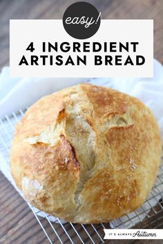 a loaf of artisan bread sitting on top of a cooling rack with the words easy 4 ingredient artisan bread