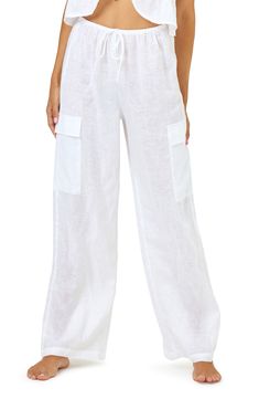 Move from beach to cocktails in these lightweight linen pants updated with cool cargo pockets. 31" inseam; 10" front rise; 14" back rise Ties at waist Cargo pockets Unlined 100% linen Hand wash, line dry Imported Casual Linen Pants With Multiple Pockets, Summer Beach Parachute Pants With Pockets, Relaxed Fit Linen Cargo Bottoms, Relaxed Fit Linen Cargo Style Bottoms, Linen Wide Leg Parachute Pants With Side Pockets, Casual Linen Parachute Pants With Cargo Pockets, Wide Leg Linen Parachute Pants With Side Pockets, Summer Loose Fit Linen Cargo Pants, Summer Vacation Parachute Pants With Pockets