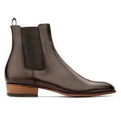 Introducing Myles, a timeless wear-with-everything essential boot.  A luxurious take on a Chelsea boot that looks as good with a slim suit as it does with dark denim.  Details too good not to mention include elegant almond toe last, a modern beveled welt, stitched leather sole and natural leather stacked heel. The hand burnishing brings out the character and richness of the Italian calf leather, each pair is unique. Pair with our Dark Brown Calf Belt. Formal Belts, Formal Accessories, Slim Suit, Shoe Tree, Denim Details, Stitching Leather, Chelsea Boot, Boots For Sale, Dark Denim