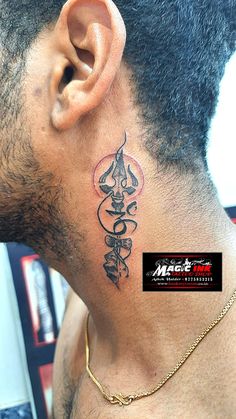 a man with a tattoo on his neck