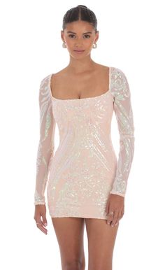 Iridescent Sequin Long Sleeve Dress in Peach | LUCY IN THE SKY Glamorous Fitted Sequin Dress For Spring, Fitted Sheer Sequin Dress For Spring, Summer Long Sleeve Mini Dress With Contrast Sequin, Fitted Contrast Sequin Mini Dress For Spring, Fitted Mini Dress With Contrast Sequin For Spring, Fitted Sheer Sequin Cocktail Dress, Fitted Sheer Sequin Dress For Cocktail, Long Sleeve Sequin Dress For Summer Prom, Spring Embellished Sequin Stretch Dress