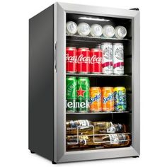 the mini fridge is filled with drinks and cans