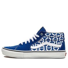 The Supreme x Vans Grosso Mid ‘Royal’ is a stylish and comfortable mid-top shoe that is perfect for any skater or sneakerhead. The mixed-material build combines royal blue suede with canvas side panels covered in a two-tone monogram print, giving the shoe a luxurious look and feel. The performance benefits of the shoe include a reinforced Duracap underlay and a PopCush insole for lightweight cushioning, making the shoe durable and comfortable. The vulcanized white rubber midsole provides excellent grip and the red license plate bearing a Supreme wordmark adds a touch of style. (SNKR/Skate/Casual/Unisex/Mid Top/Crossover) Mid Top Shoes, S Monogram, Vans Shop, Mid Top, Monogram Prints, The Supreme, Blue Suede, Side Panels, Stylish Sneakers