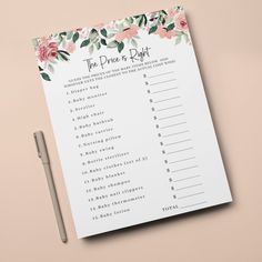 a pink and green floral printable baby shower game on top of a white table