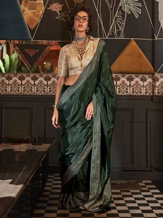 Celebrate your upcoming festivals, events, and any occasion with our mesmerizing green weaving silk saree with blouse. This stunning ensemble features intricate weaving work on the silk fabric, giving you a chic and elegant look. The saree comes in a beautiful green color, while the cream color art silk blouse complements the saree perfectly with its zari weaving work.
The saree measures 5.50 meters, providing you with ample fabric to drape and style in different ways. The unstitched blouse mate Green Weaving, Drapping Saree, Cream Silk Blouse, Patiala Salwar, Half Sleeve Blouse, Cream Blouse, Party Kleidung, Stylish Sarees, Organza Saree