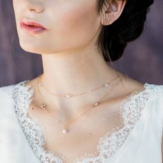 "This beautiful delicate bridal necklace is just divine!  It just sparkles with simple elegance.  Layered and accented with alternating Preciosa clear crystal beads and clear crystal channel chains all hand linked along this delicate chain.  The longer layer has a beautiful 6mm freshwater pearl drop. Finished with a spring ring clasp and available in 2 lengths. To purchase this design as a back necklace visit this listing https://www.etsy.com/ca/listing/573918896/rose-gold-crystal-pearl-layered- Elegant Rose Gold Crystal Necklace For Wedding, Rose Gold Wedding Necklaces With Diamond Accents, Rose Gold Wedding Necklace With Diamond Accents, Rose Gold Diamond Accent Wedding Necklace, Wedding Rose Gold Necklace With Diamond Accents, Delicate White Backdrop Necklace For Wedding, Delicate Gold Crystal Necklace For Wedding, Delicate Crystal Necklaces For Anniversary, Dainty Gold Crystal Necklace For Wedding