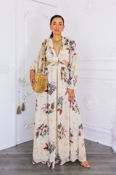 Have a blast on your tropical getaway in this stunning Resort Floral Bubble Sleeves Maxi Dress! The lace tied up back and ruffle details on long sleeves add a touch of romance. The flowy maxi fit and elastic waistband flatter all body types. Perfect for any resort vacation, this dress fits true to size. Model is 5’4 and in 3 inch heels. She is wearing a size small. Flowy Long Sleeve Maxi Dress For Beach, Long Sleeve Maxi Dress For Vacation, Spring Beach Long Sleeve Maxi Dress, Flowy Long Sleeve Maxi Dress For Vacation, Summer Tropical Print Long Sleeve Maxi Dress, Long Sleeve Tropical Print Maxi Dress For Summer, Long Sleeve Beachwear Maxi Dress For Beach Season, Long Sleeve Maxi Dress For Beach Day Out, Long Sleeve Beachwear Maxi Dress