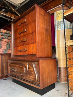 This is a beautiful mid century modern Highboy dresser or gentlemen's chest. Designed for and manufactured by Pulaski Furniture Company circa 1960's. Features a walnut cabinet with four top drawers and two larger bottom drawers. The top drawers have sculpted handles and the bottoms have sculpted faces. It is in amazing original condition with only minor wear consistent with the age of the piece.  Measures 44.25" wide, 19" deep and 61.5" tall There is a shipping fee for this piece. Please contact Fair Quotes, Pulaski Furniture, Four Tops, Walnut Cabinets, Top Drawer, Bedroom Furniture Dresser, Furniture Companies, Living Furniture, Walnut