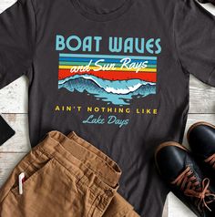 Boat Waves and Sun Rays, Ain't Nothing Like Lake Days! Discover our collection of high-quality humorous nautical boating t-shirts, designed for both style and comfort. Our t-shirts feature mostly unique maritime-inspired designs. Whether you're a passionate sailor or simply love the water, our nautical boating themed t-shirts are perfect for expressing your love for all things A Little Nauti. Each t-shirt is carefully crafted to ensure durability and fit. Not only do our t-shirts offer exception Summer Crew Neck T-shirt With Graphic Print, Outdoor Cotton Crew T-shirt, Graphic Print Crew Neck T-shirt For Boating, Summer Boating T-shirt With Crew Neck, Summer Crew Neck T-shirt For Boating, Summer Boating T-shirt With Short Sleeves, Summer Graphic Print Crew T-shirt, Summer Short Sleeve T-shirt For Boating, Casual Crew Neck T-shirt For Boating