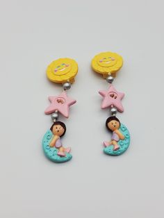 RARE polly pocket dream dangle earrings in immaculate condition. The earrings are in excellent condition with no chipping or damage. The characters have clear features. The clip on is in fantastic condition and closes firmly. These are a collectors item and are of the quality to sit well in the best collections. Please review all photographs as these form part of the description. Cute Star Charm Dangle Earrings, Cute Dangle Earrings With Star Charm, Pink Star Charm Dangle Earrings, Pink Dangle Earrings With Star Charm, Pocket Princess, Cute Piercings, Crystal Heart Pendant, Polly Pocket, Bear Doll