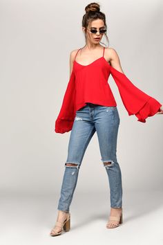 With Wide, Double Layer Sleeves, You Won'T Be Able To Resist Making Shapes With The Red Jillian Cold Shoulder Blouse. A Peasant Blouse You Can Wear In The Evening, The Backless Blouse Has Deep Cold Shoulder Cutouts And Delicate Shoulder Straps, With Ties At The Back. Live The Drama. Cold Shoulder Blouse For Night Out In Fall, Red Off-shoulder Top For Night Out, Fall Party Blouse With Cold Shoulder, Summer Party Blouse With Cold Shoulder, Summer Party Cold Shoulder Blouse, Fall Party Cold Shoulder Blouse, Chic Spaghetti Strap Tops For Fall, Fitted Cold Shoulder Blouse For Party, Red Off-shoulder Top For Spring