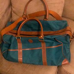 Bag #1 (Picture #1): Size: X Large Duffle Bag Strap Included: Yes Stains: Yes On The Exterior As Seen In Pictures Holes/ Rips/ Tears: No Odors: Yes Bag Has Been In Storage Interior: Clean Zippers Work: Yes Bag #2 (Picture #2): Size: Large Duffle Bag Strap Included: No Stains: Yes On The Exterior As Seen In Pictures Holes/ Rips/ Tears: No Odors: Yes Bag Has Been In Storage Interior: Clean Zippers Work: Yes Ships Same Day If Order Is Placed Before 3pm Est Unless It’s A Holiday Or Sunday. *Comes From A Pet Free And Smoke Free Home Also See In My Closet: Forever 21, Coach, Victoria’s Secret, Banana Republic, Vera Bradley, Tru Religion, Lucky Brand, Dkny, Nike, And Under Armo Rectangular Coated Canvas Travel Bag With Handles, Elegant Green Bags With Leather Trim, Green Rectangular Bag With Leather Trim, Designer Rectangular Bag For Overnight Trips, Large Duffle Bag, Ralph Lauren Vintage, Ralph Lauren Bags, Interior Clean, Duffel Bags