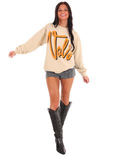 Let your fandom shine in this delightfully 'thrifted' Vols sweatshirt! Featuring an official script font for Tennessee Football, this meaningfully distressed sand sweatshirt will keep you comfy while you cheer on your team with style. Go Vols! Thrifted Sweatshirt, Tennessee Vols Jewelry, Gameday Sweatshirt, Tennessee Vols Shirts, Tennessee Vols Apparel, Vintage Tennessee Vols Sweatshirt, Go Vols, Tennessee Football, Script Font