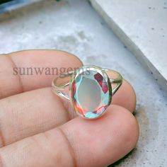 Angel Aura Quartz Ring , 925 Sterling Silver Ring , Handmade Silver Ring , Oval Angel Aura Quartz Gemstone Ring , Ring For Women * If you are satisfied with the service you have received from us, please let us know. Please share your valuable feedback on Etsy. * We are also taking custom orders. Contact us to buy items in bulk. * We can make beautiful jewelry with this gemstone. Please contact me. Visit Our Shop :- https://www.etsy.com/shop/sunwangems Thank you  For Visiting our shop Sunwangems Silver Faceted Oval Crystal Ring, Iridescent Oval Crystal Ring As Gift, Iridescent Oval Crystal Ring For Gift, Iridescent Oval Crystal Ring Gift, Iridescent Oval Sterling Silver Rings, Iridescent Oval Spiritual Rings, Spiritual Iridescent Oval Rings, Silver Faceted Oval Moonstone Ring, Handmade Silver Ring