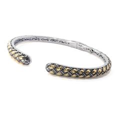 Perfect for everyday wear, this Artisan Silver by Samuel B. bangle bracelet is filled with gorgeous style and ornate details. It's crafted in sterling silver with an eye-catching woven-look design featuring 18K yellow gold accents There's even cutout scrollwork and a diamond accent on the interior. Choose from 6.5" or 7.25" and 4-7.5mm or 7-11mm. Pair it with matching earrings 204-147 for a stunning coordinated style. Elegant Engraved Braided Bangle Bracelet, Adjustable Luxury Bracelets With Intricate Design, Luxury Adjustable Bracelets With Intricate Design, Elegant Braided Bangle Bracelets For Formal Occasions, Elegant Formal Braided Bangle Bracelets, Elegant Formal Braided Bangle Bracelet, Gold Sterling Silver Bangle With Intricate Design, Gorgeous Style, All Gems