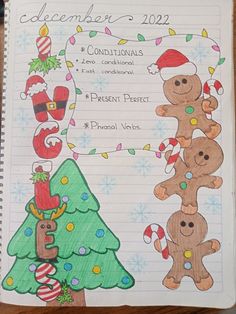 a notebook with christmas themed drawings on it