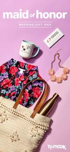 a flowery purse and other items on a pink background