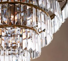 a crystal chandelier hanging from a ceiling