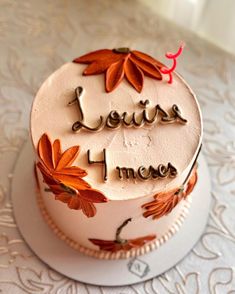 there is a cake that has leaves on it