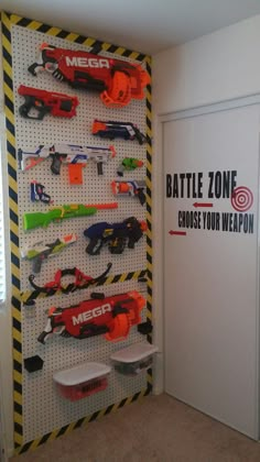 Boho Video Game Room, Nurf Wall, Pegboard Nerf Wall, Nerf Armory Wall, Nerf Wall Boy Rooms, Nerf Pegboard Wall, Nerf Bedroom Ideas, Nerf Room Ideas Boys, Sonic The Hedgehog Room Ideas