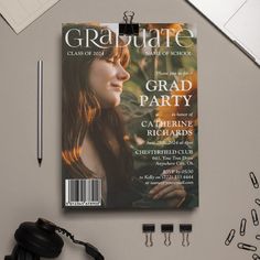 an image of a magazine cover with headphones on the table next to it and other office supplies