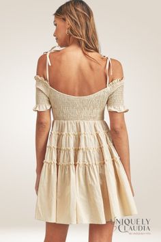 The Leslie Smocked Off-Shoulder Mini Tiered Dress is the perfect mix of femininity, style, and fun! The smocked bodice with ruffled trim clings to your curves in all the right places, accentuating your natural shape for effortless beauty. Add to that the adjustable tie-straps on the off-the-shoulder look, and you have a timelessly sweet style that will turn heads wherever you go. We've then finished it off with four tiers for a flowy A-line skirt will flatter your figure and provide maximum move Femininity Style, Spring Dresses Women, Effortless Beauty, Sweet Style, Natural Shapes, Affordable Luxury, Tiered Dress, Spring Dresses, A Line Skirt