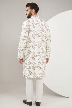 White kurta with florette print and thread embroidery. Comes with a pant. - Aza Fashions