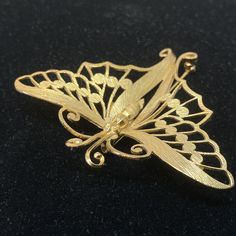 Elegant vintage Napier butterfly brooch About 2 inches long Goldtone metal with no damage Elegant Butterfly Brooch For Collectors, Elegant Collectible Butterfly Brooches, Elegant Butterfly Brooches For Collectors, Elegant Butterfly Brooch, Gold Butterfly Brooches For Collectors, Vintage Butterfly Brooch For Formal Occasions, Gold Butterfly Brooch For Formal Occasions, Gold Butterfly Brooch For Wedding, Gold Butterfly Brooches For Wedding