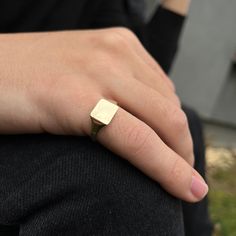 This 14k Solid Gold Ring ''was'' only classy men's love. Nowadays this square signet pinky ring is a cool piece combined with daily outfits.  It's also a signet ring and engravable.  The ring on pictures is made of 14k Solid Yellow Gold. We can produce it in 14k White Gold or 14k Rose Gold you can choose from options section. Engraving is free for this engravable crest ring. We can engrave on it monogram, crest, letter, number, date or big initials on ring. Enter the name, date, monogram, number Classic Rectangular Signet Ring Stamped 14k, Rectangular 14k Gold Signet Ring Gift, Minimalist Square Cut Signet Ring As Gift, Minimalist Square Cut Signet Ring For Gift, Minimalist Square Signet Ring Gift, Rectangular Signet Ring As Fine Jewelry Gift, Classic Rectangular Engraved Ring For Everyday, Classic Everyday Engraved Rectangular Ring, Rectangular 14k Gold Signet Ring Fine Jewelry