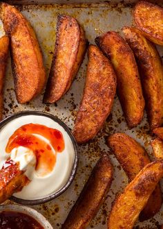 baked potato wedges with ketchup and sour cream