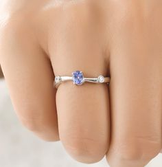 Natural Tanzanite Ring, Tanzanite Jewelry, Silver Ring, Boho Ring, Statement Ring, Gift for Her, Artisan Ring, Christmas Sale, Mom Gift Ring S T O N E ∙ D E T A I L S *Gemstone: tanzanite *Gemstone Type: Natural *Gemstone Shape: Oval (4*5) *Number of Gemstones: 1 *Gemstone Weight:0.42 Cts *Gemstone Grade: AAA *Accent Stones: Cubic Zirconia M E T A L ∙ D E T A I L S  *Metal Color: Rose Gold, Yellow Gold, White Gold *Metal: 925 Silver, 10k, 14k, 18k *Ring Size measure: Sizeable 4-14 US  *Setting: Tanzanite Ring With Round Band For Gift, Fine Jewelry Tanzanite Ring For Gift, Tanzanite Ring With Round Band, Tanzanite Round Rings As Gift, Tanzanite Round Ring As A Gift, Round Tanzanite Rings For Gifts, Tanzanite Birthstone Rings For Gifts, Tanzanite Birthstone Ring As A Gift, Tanzanite Solitaire Ring Gift