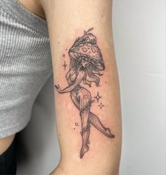 a woman with a tattoo on her arm