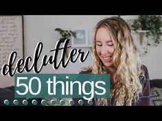 a woman sitting on top of a bed with the words declutter 50 things