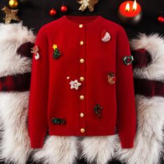 Festive Red Christmas Cardigan with Holiday-Themed Embellishments--Cozy Winter Knit Sweater for Women Add some festive flair to your winter wardrobe with this charming red Christmas cardigan! Featuring adorable 3D embellishments like reindeer, Santa, Christmas trees, and more, this cozy knit sweater is perfect for holiday parties, family gatherings, or just spreading cheer throughout the season. Crafted from soft, warm material, it keeps you comfortable and stylish in the chilly weather. Whether you're looking for a unique holiday outfit or a thoughtful gift, this cardigan is sure to stand out. Pair it with jeans, skirts, or leggings for a cute and festive look that's perfect for any occasion. Celebrate the holiday spirit with this fun and functional Christmas sweater! Christmas Knitted Long Sleeve Cardigan, Knitted Long Sleeve Christmas Cardigan, Red Winter Sweater With Buttons, Red Buttoned Sweater For Winter, Red Sweater With Buttons For Winter, Long Sleeve Christmas Cardigan, Festive Long Sleeve Christmas Cardigan, Red Festive Winter Sweater, Red Winter Festive Outerwear