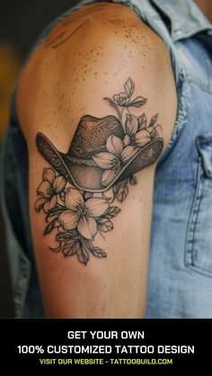 a man's arm with flowers and a hat on it, which reads get your own 100 % customized tattoo design visit our website