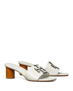 Tory Burch Women's Ines Mule Sandals Luxury Summer Mules With Wooden Heel, Luxury Open Toe Sandals With Wooden Heel, Luxury Mules With Wooden Heel For Summer, Designer Sandals With Wooden Block Heel, Designer Sandals With Wooden Heel, Luxury Tan Open Toe Sandals, Luxury Tan Heels For Summer, Luxury Tan Sandals For Spring, Tan Formal Sandals For Summer