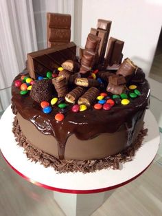 a chocolate cake with candy and candies on top