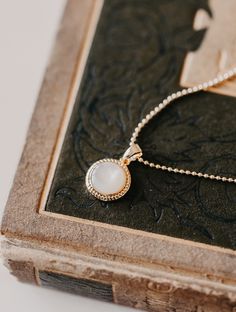 Details: -18'' gold-filled ball chain -Mother of pearl pendant Adornment Jewelry, Outdoor Textiles, Ball Chain, Pearl Pendant, Paper Goods, Mother Of Pearl, Stationery Paper, Gold Filled, Jewelry Accessories