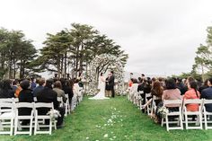 a couple getting married at the end of their wedding ceremony