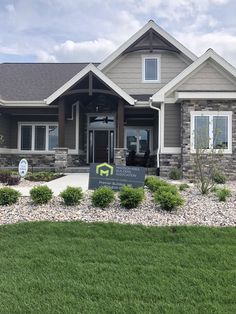 a house with a sign in front of it that says welcome to the homeowners