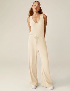 Jetsetter Jumpsuit | Beyond Yoga Stretch Ribbed Jumpsuits And Rompers For Loungewear, Chic Solid Ribbed Jumpsuits And Rompers, Casual Ribbed Jumpsuits And Rompers For Lounging, Chic Ribbed Jumpsuits And Rompers For Summer, Chic Ribbed Jumpsuits And Rompers For Spring, Ribbed V-neck Jumpsuit For Loungewear, Midi Jumpsuit, Yoga Apparel, Before Running