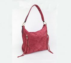 "This is Shayan hobo bag from Italian suede leather with a unique soft surface in red color (slight dark red ) Shayan hobo bag is highly functional, providing you with plenty of space to carry your essentials around with ease. Dimensions: Height - 26 cm ( 10.24 \") Width - 27 cm ( 10.63 \") Depth- 12 cm ( 4.72 \") (depth is measured across bottom of backpack) Key features: * The sturdy zip closure ensures that your belongings remain safe, whether you're at work or traveling. * A large front pock Burgundy Shoulder Hobo Bag With Zipper Closure, Burgundy Hobo Bag With Zipper For Daily Use, Burgundy Hobo Bag With Zipper Closure For Daily Use, Burgundy Hobo Shoulder Bag, Burgundy Hobo Bag With Soft Leather For Daily Use, Daily Use Burgundy Hobo Bag With Soft Leather, Soft Leather Burgundy Hobo Shoulder Bag, Burgundy Soft Leather Hobo Bag With Double Handle, Burgundy Soft Leather Hobo Shoulder Bag