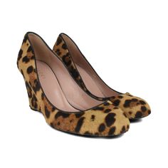 Gucci wedge heels in brown pony hair with an all-over cheetah print, black leather trim, a small 'GG' on the back heels in silver hardware, and a rounded toe. Brand = Gucci Size = 36 Condition = 8/10, Very good. Material = Ponyhair, leather Heel Height = 90mm SKU = 16872-5 Chic Leopard Print Heels With Round Toe, Leopard Print Leather Heels For Workwear, Gucci Luxury Wedge Heels, Chic Leopard Print Round Toe Heels, Luxury Leopard Print Round Toe Heels, Leopard Print Closed Toe Leather Heels, Leopard Print Open Toe Leather Heels, Luxury Leopard Print Leather Heels, Leopard Print Top Handle Bag With Gold-tone Hardware