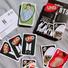 uno uno cards are laid out on the bed