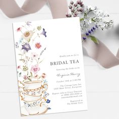 a bridal tea party with flowers and ribbons