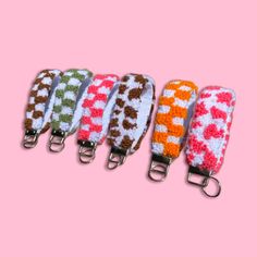 Handmade Punch Needle Wristlet Keychains - Elevate your keys with charm and style! 🌟 Introducing our collection of handmade wristlet keychains, crafted with love and precision. Each keychain is a miniature work of art, featuring intricate punch needle designs in six different adorable patterns. 🎨 Choose from a variety of charming motifs, including: Pink, orange, green and brown checkered Pink or brown cow print Vibrant colors and premium materials ensure durability and flair, making these keychains a perfect accessory for your keys, bags, or even as a decorative accent for your home. These keychains make fantastic gifts for loved ones, adding a touch of personality and functionality to their everyday essentials. Handcrafted with care and attention to detail, each keychain is unique, addi Cute Punch Needle, Punch Needle Designs, Brown Cow Print, Her Aesthetic, Wristlet Keychains, Brown Checkered, Handmade Wristlet, H.e.r Aesthetic, Brown Cow